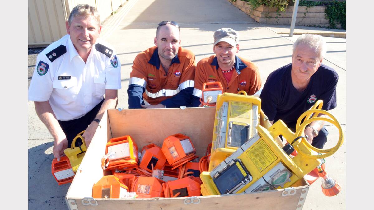 Pictured with the electrical boards that amount to $14000 are Superintendent Ken Neville, Northparkes Mines electrical Supervisors, Matt Hancock and Robert Gronn, and Captain of the MLVT Mike Browne.