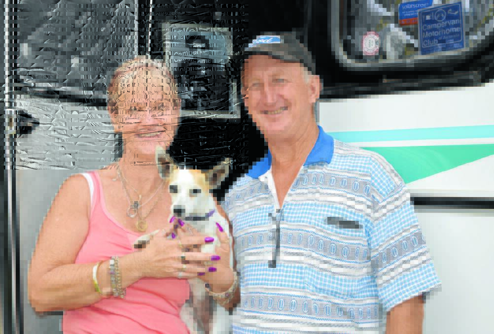 Lyn and Peter Davis are here for their 10th Festival in a row. It is the first time for pooch, Wagz. Photo: Barbara Watt   