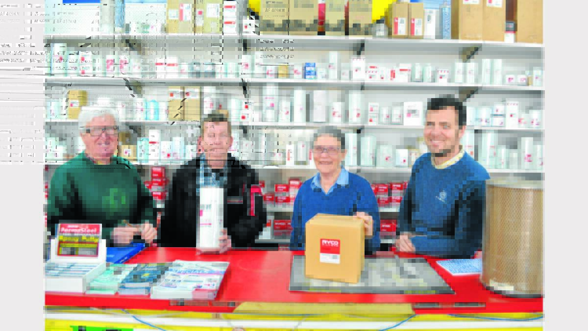 Friendly of service at A A Blatch – left to right, Warren Blatch, Mike Davies, Nancye Blatch and son Allan with some of the range of oil filters.