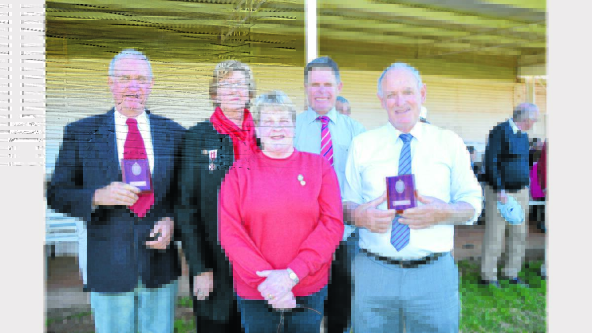 Pictured after the offical opening and award presentation at the Peak Hill Show are from left - John Paddison (recipient of 50 years service award), Pam Bell (Red Cross official), Pauline Gallagher (Secretary), Ian Westcott (out-going president) and Andy Strahorn (recipient of 50 years service award). Photo: Barbara Reeves 