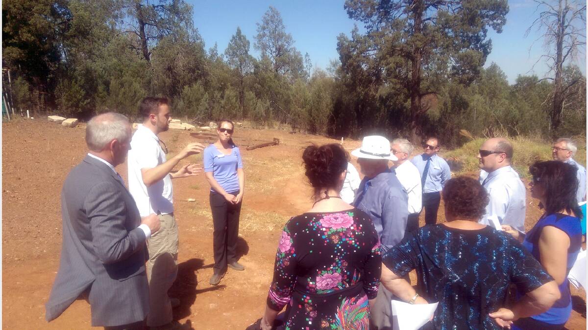 Parkes Shire Councillors and staff receive an update from a representative from NBN Co. during a brief inspection of the proposed site for a fixed wireless NBN tower off Back Yamma Road prior to  thelast council meeting.   