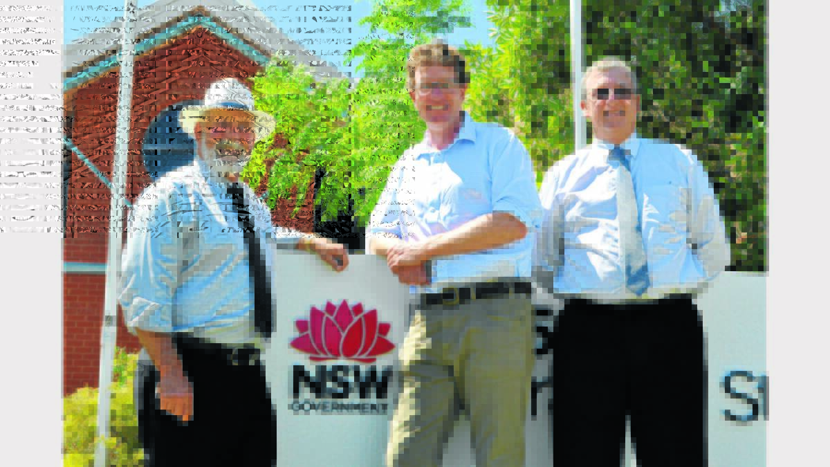 Parkes Mayor Ken Keith, Member for Orange, Andrew Gee, and Western Region Manager of the Roads and Maritime Services, Phil Standen at the announcement of the Service NSW shop for Parkes at the RMS office in Currajong Street.  A site for the new centre is yet to be determined. Photo: Barbara Reeves 
