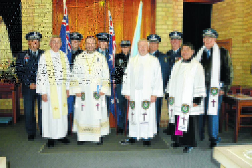 Scenes from the National Police Remembrance Day Service held at Holy Family Catholic Church on Monday. 