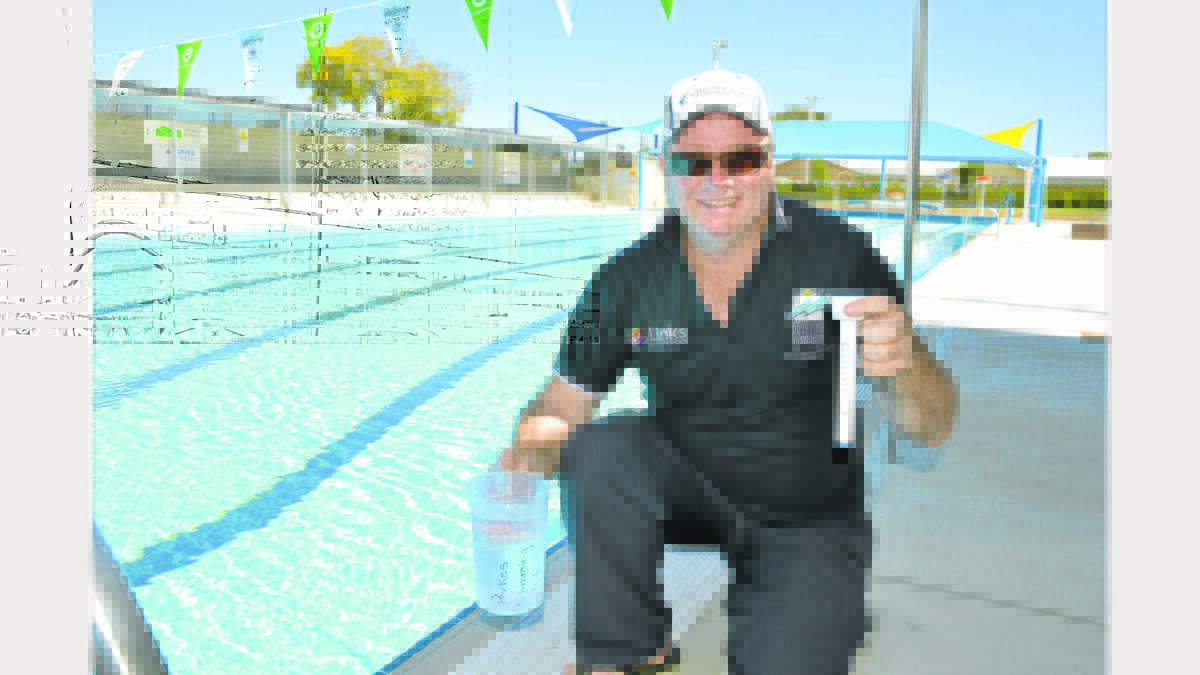 “Come on in... the water is a balmy 28 degrees!” Pool Superintendent Rob Aston-Brien extends an invitation to the Parkes community to enjoy a swim this weekend. The Parkes Pool will open at 10am this Saturday, offically kicking off the 2014/15  season. Photo: Bill Jayet 