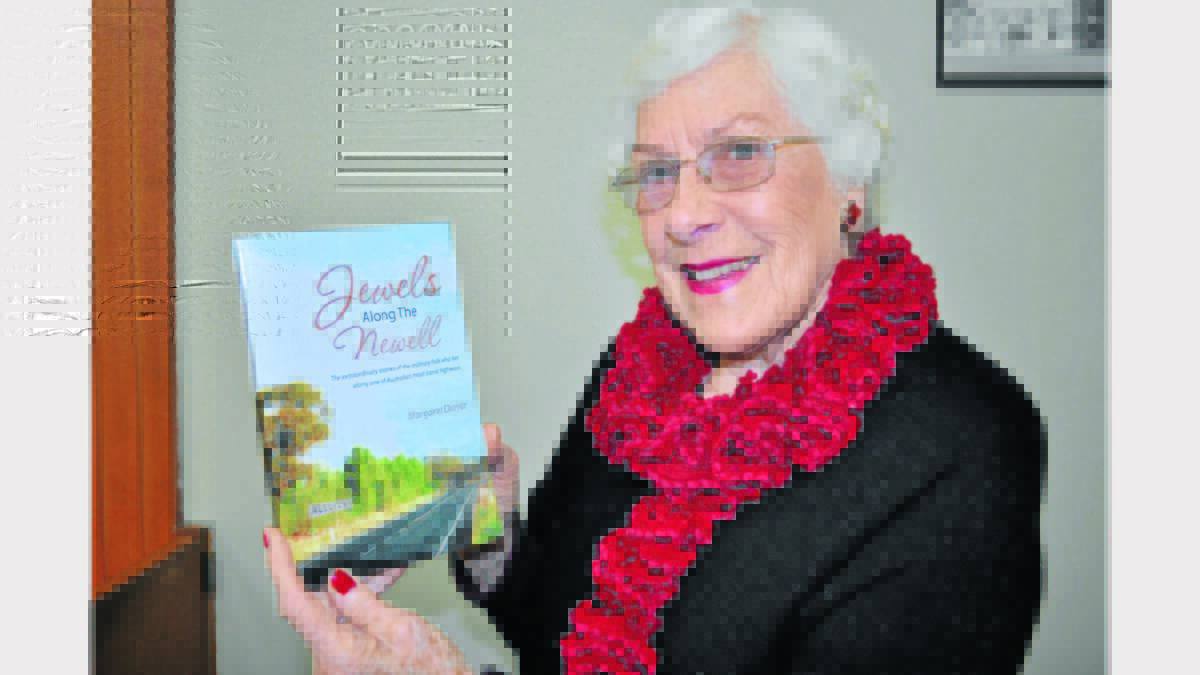Margaret Dwyer with her latest book, Jewels Along the Newell.