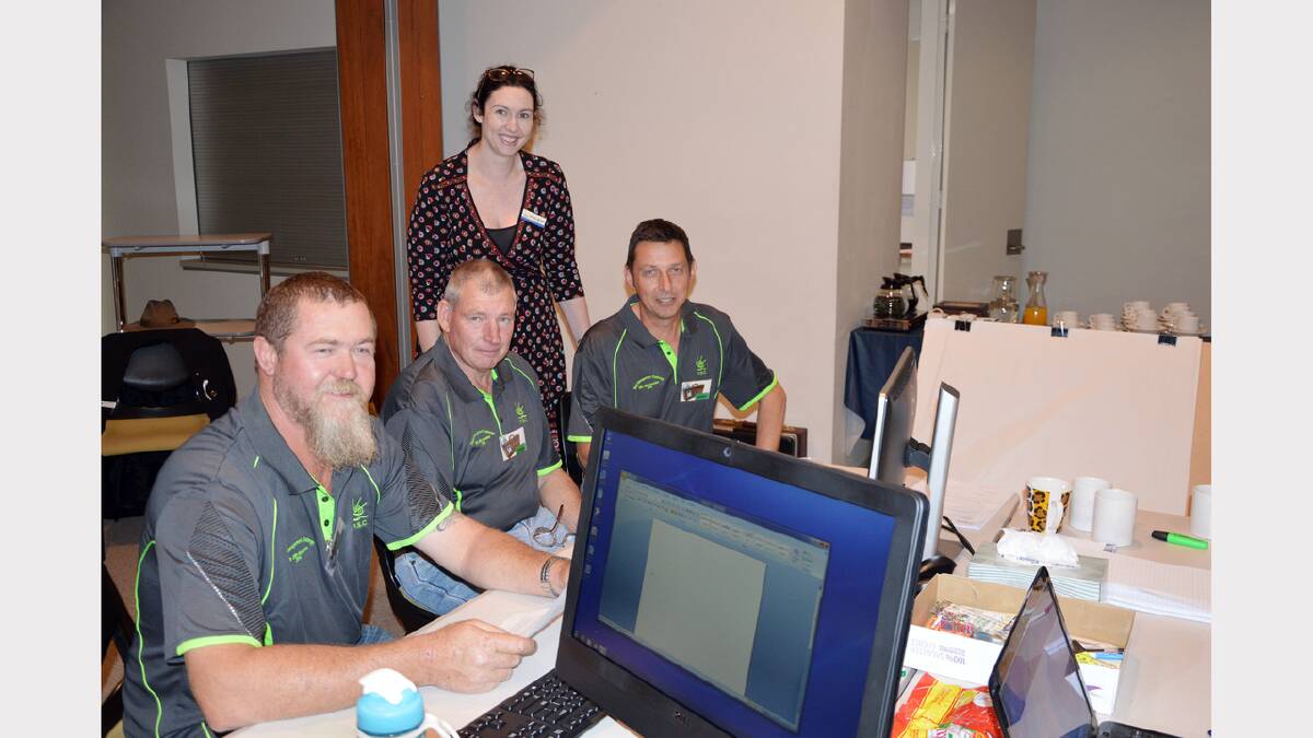 Parkes Shire staff, Mark Blackstock, Brian Smith and Russell Tanswell, with Anna Wyllie during yesterday’s challenge. 