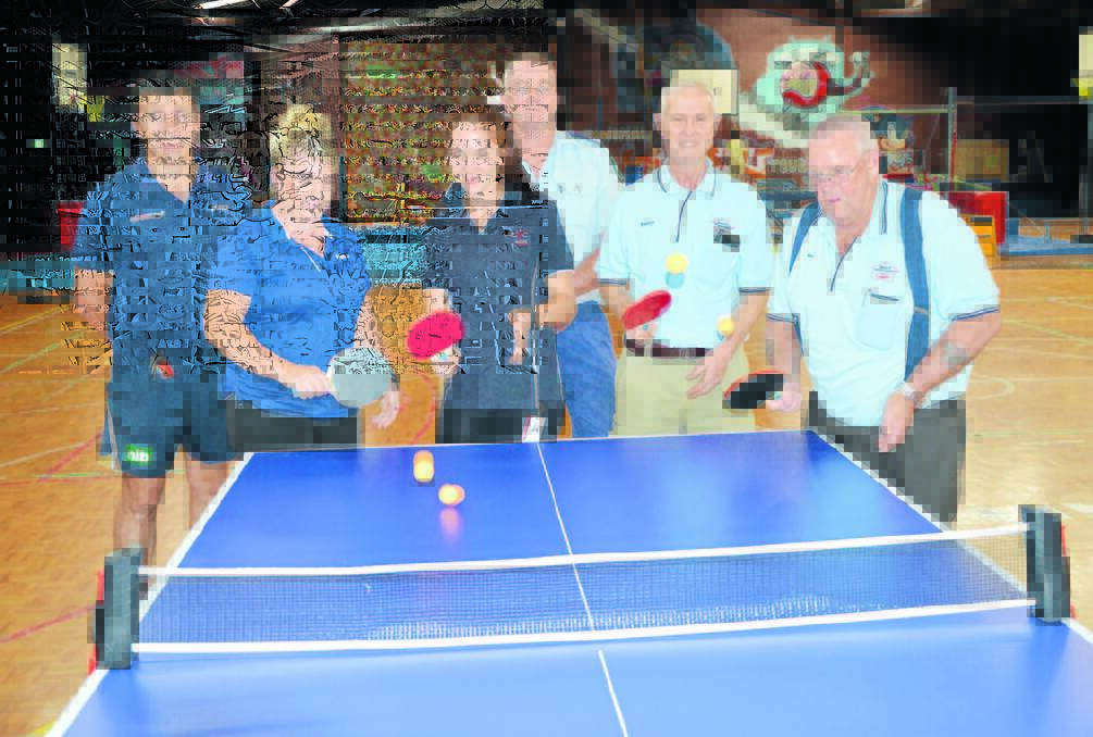 Testing out the new table tennis table at the Parkes PCYC are from left, John Lovett (Sportspower), Amanda Sutton and Maddie Potts (Parkes PCYC), Simon Lockwood (PCYC), Trevor Gilbert and Ron Fewings (Men’s Shed).  Photo: Roel ten Cate.  