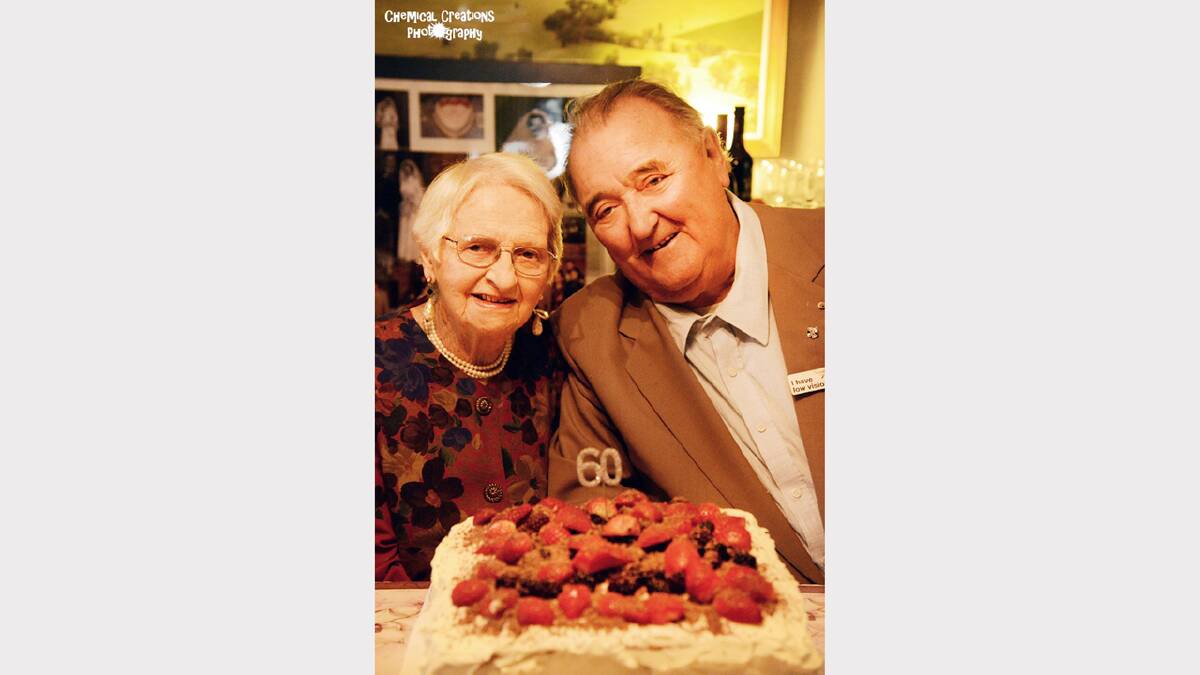 Trudy and Bill with their anniversary cake.