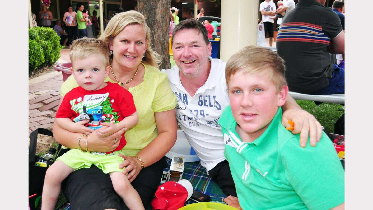 Darrin Gibson, Deb and their family relax at the Parkes Early Childhood Christmas party last year.                     	 									    Photo: Bill Jayet.           
