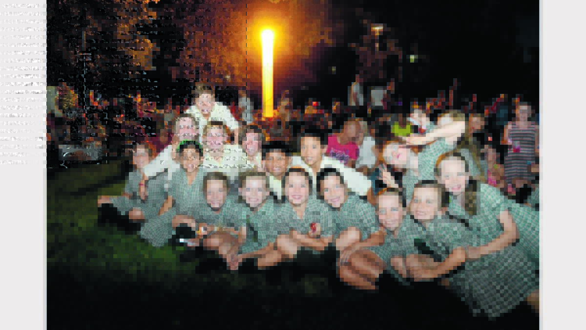 Scenes from Carols by Candlelight held in Cooke Park on Sunday. Photos: Renee Powell