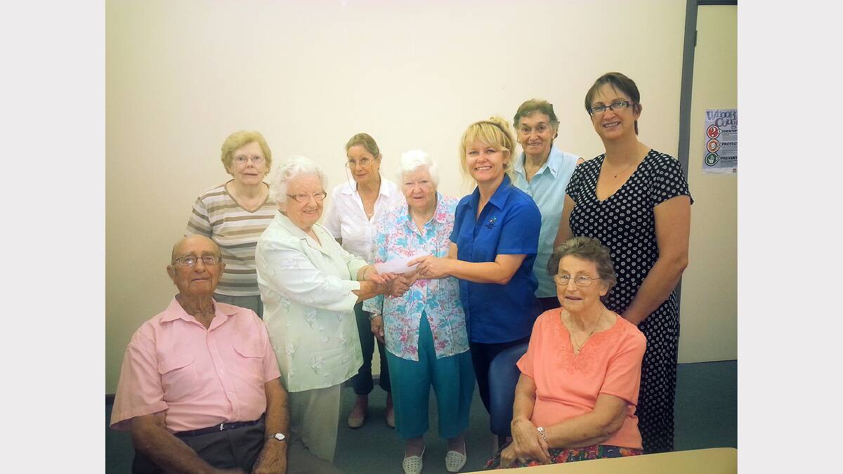 Pictured at the presentation by the M and D Society of a very generous donation to the Parkinson’s Group are standing, Kath Pollock, Dell Patton, Maureen White, Eileen Ford, Lyn Townsend (M and D), Janet Cheney, Gail Smith (M and D); and seated, Geoff Patton and Barbara Schultz.
