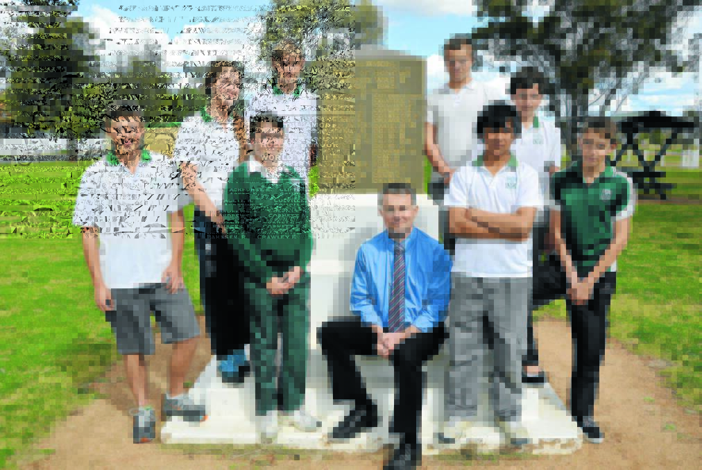 Proud Tullamore Central School Principal Peter Nichols with the eight students who will vie for the four positions to attend next year's Commemoration Dawn Service at Gallipoli. Pictured (left to right) Morgan King, Hannah Walker, Kimberley Cashman, Dominic Lopez, Jake Cashman, Codie Powell, Harrison Jones and Andrew Ashe.    Photo: Bill Jayet   