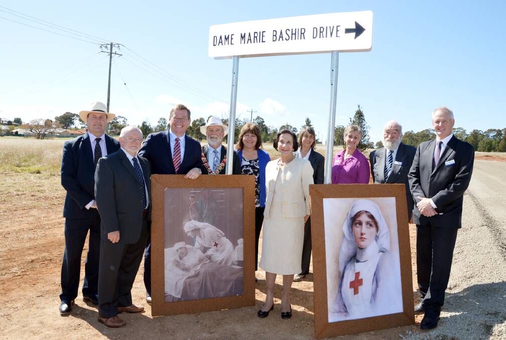 Marie Bashir is pictured after the sign was unveiled, with local Health Service personnel, dignitaries, councillors and local MPs.  Photo: Bill Jayet. 