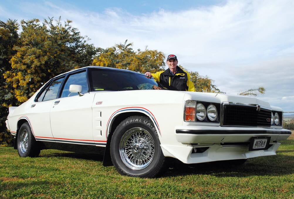 Scott Patton is pictured with his impressive HZ Holden which has won a stack of awards. 