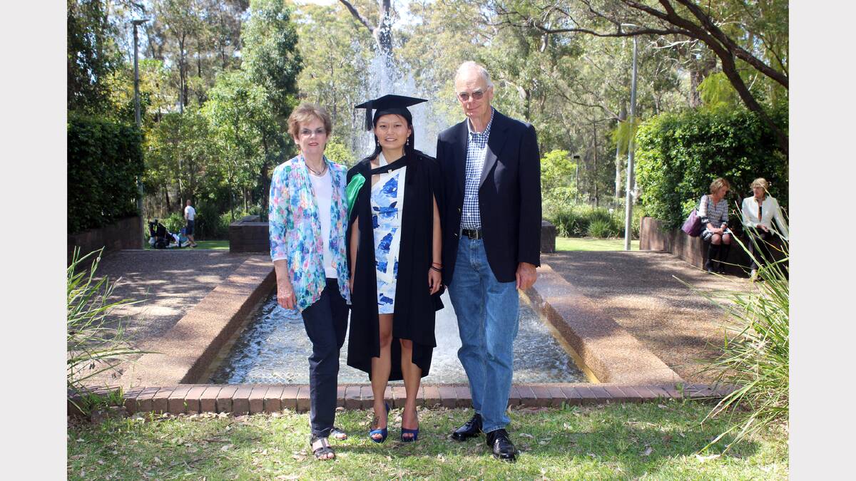 Nicole (Seton) is pictured with her parents, former local residents, Fred and Jean Massurit. 