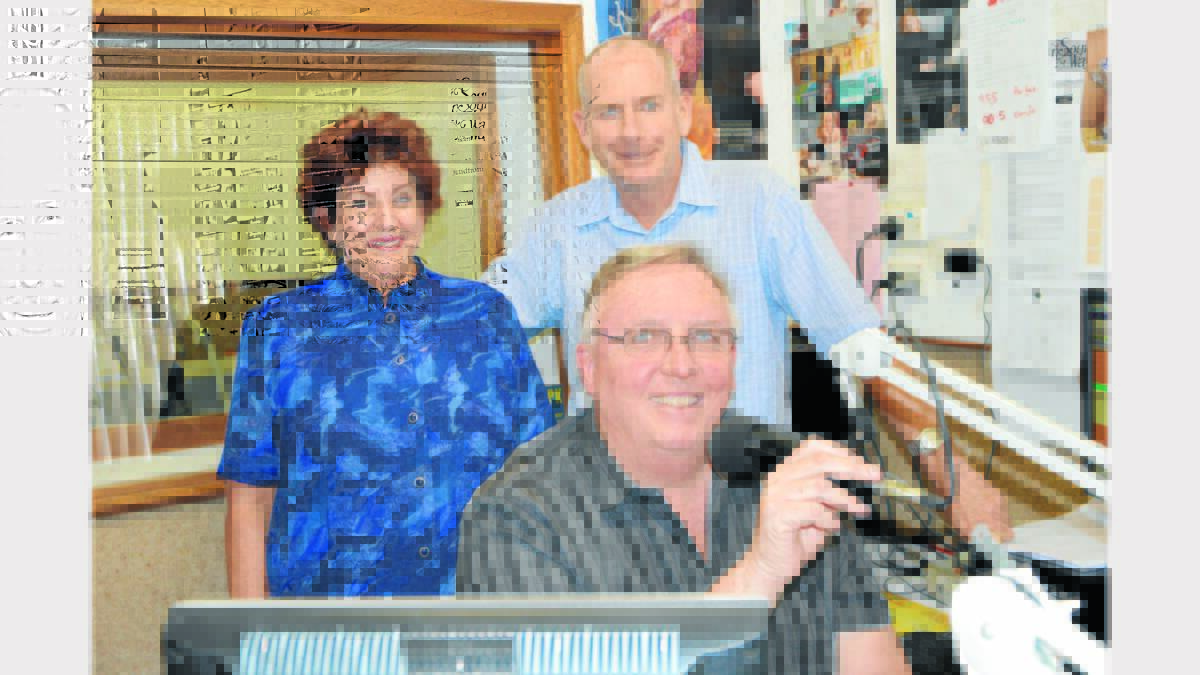 Radio announcer, Trevor Young is leaving Parkes after almost 20 years.  He is pictured with local station manager, Jacqui Sullivan (who has been there for some 25 years) and radio announcer, Tom Furey who came to Parkes from FlowFM Barossa about 18 months ago). Photo: Roel ten Cate. 