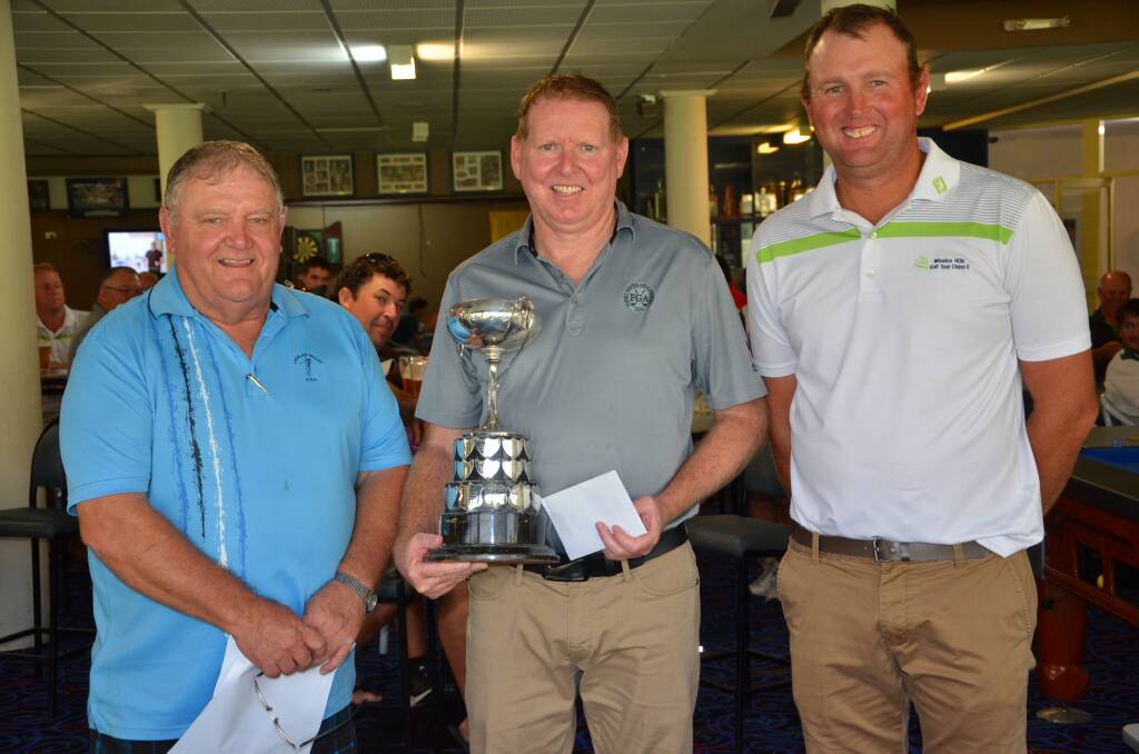 Moulder Cup winner Peter Dawson (centre) with Lachlan Valley Golf president Paul Thomas and Captain of LVDGA Steve Betland.
