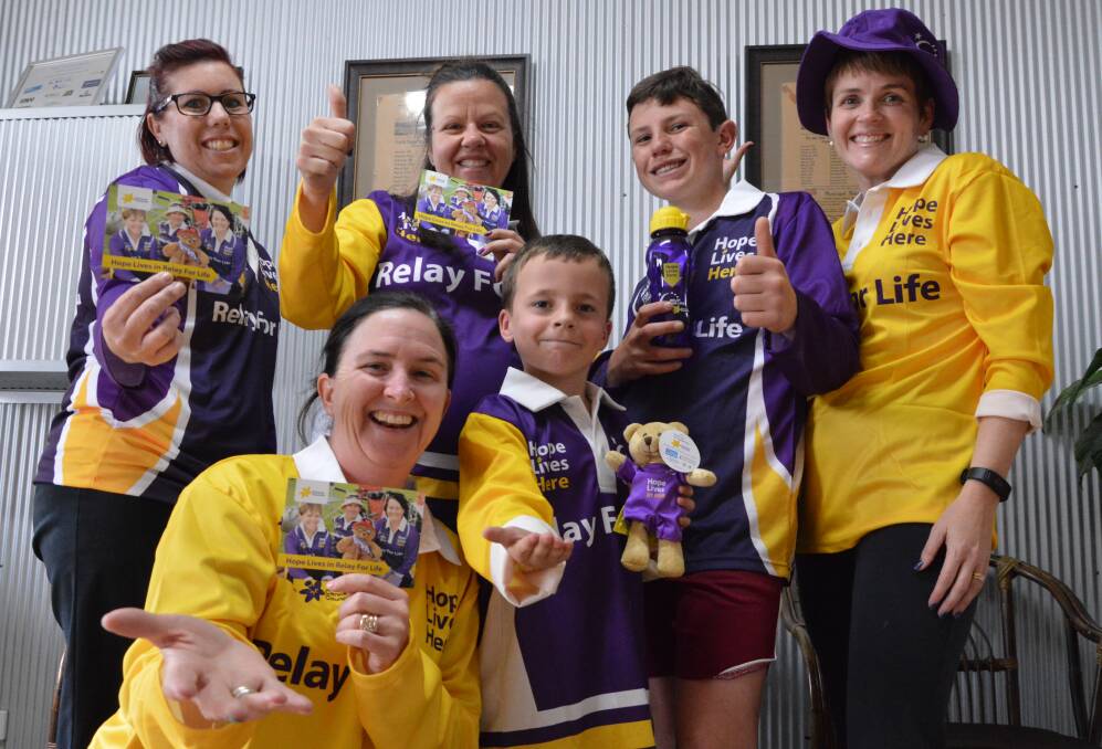 RELAY READY: Back, Kelly Logan, Kirsty Van Ryn, Ty Logan and Parkes Relay for Life committee member Di Orr; (front) committee member Renee Rice and Kasey Ehsman (7) are ready for Saturday's Relay for Life.