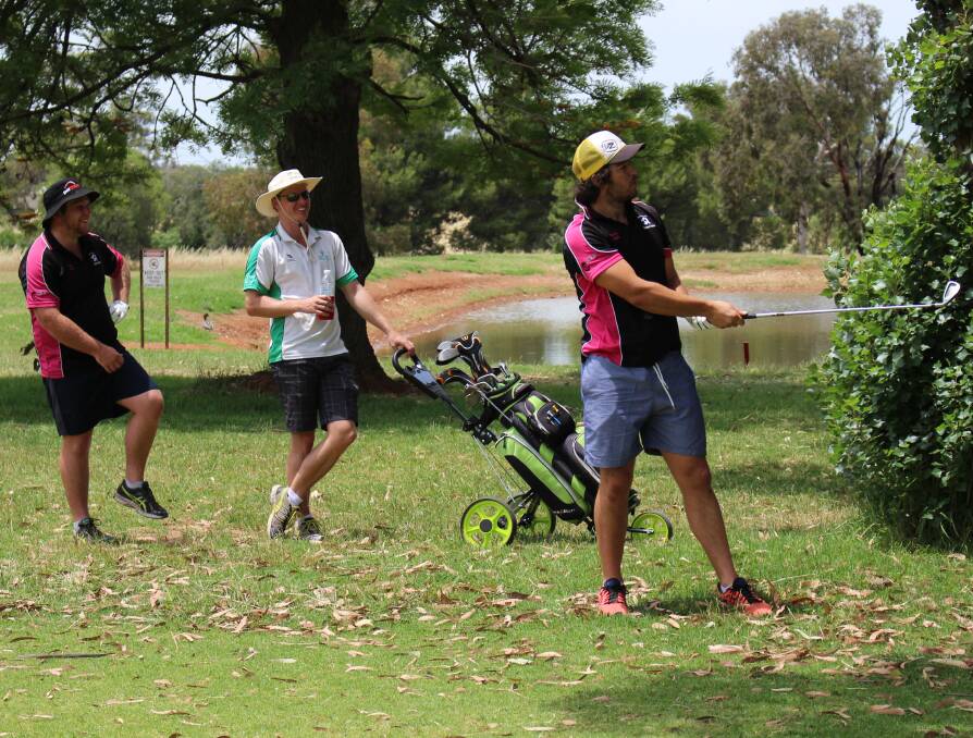 ROUGHING IT: Daniel Clark found himself in a bit of a rough spot as team mates Max Keith (left) and Scott Knight enjoy a laugh at last month's charity golf day for autism and special needs awareness. Photos: Paul Thomas