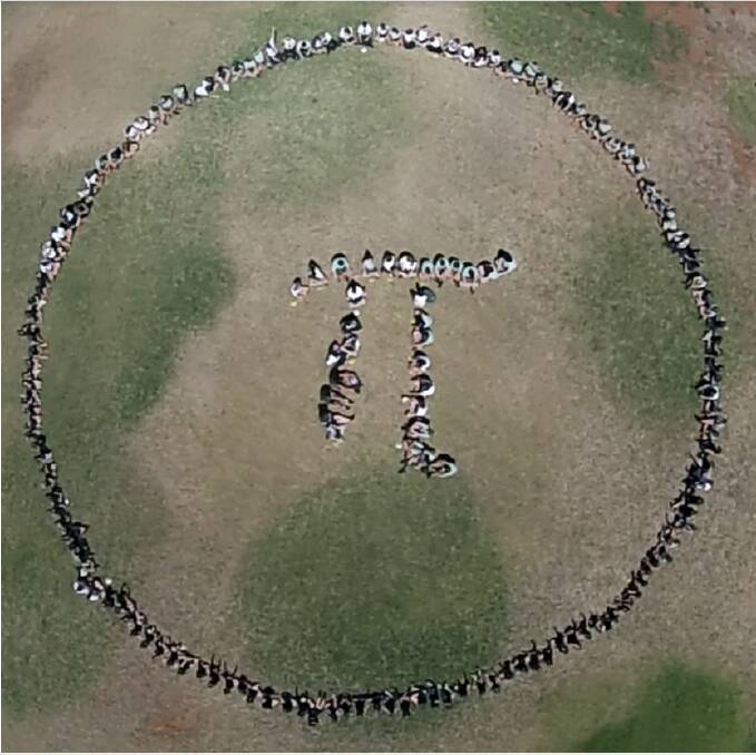 MARCH 14 IS PI DAY (3.14): Parkes Christian School students gathered for this photo - taken from a drone - on Friday, all for Pi Day.