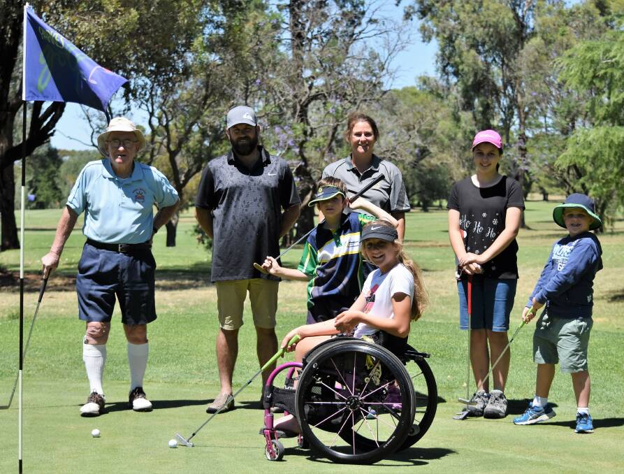 SOCIAL: Bill Warren joined Garth, Patrick, Deanne and Victoria  Simpson, Kasey Fay-Rice and Kade Ashcroft for the Parkes Services Social Club and junior golf event last month. Photos: Jenny Kingham