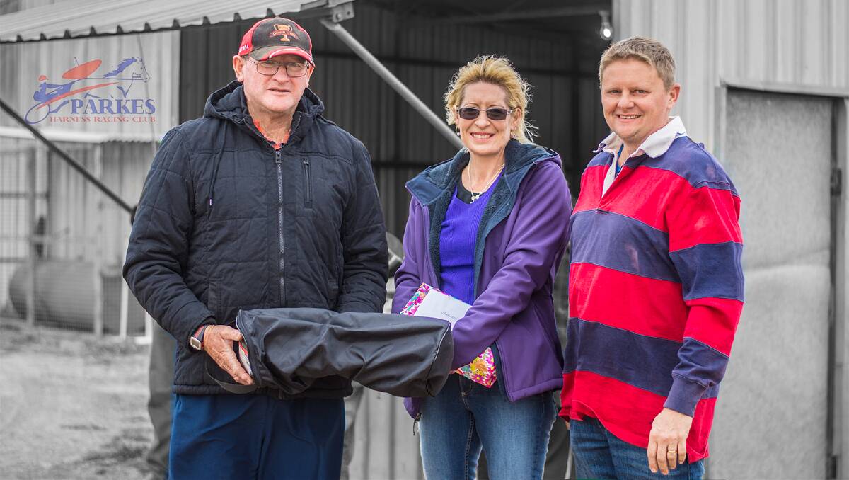 END OF SEASON: Parkes Harness Racing Owners and Trainers Association president Ian Logan with sponsors Debbie and Steve Blaxland of Parkes Farm Centre.