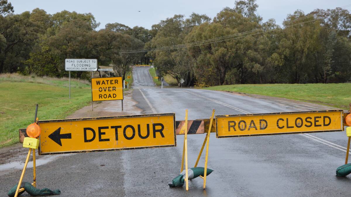 Wet weather closes roads in shire