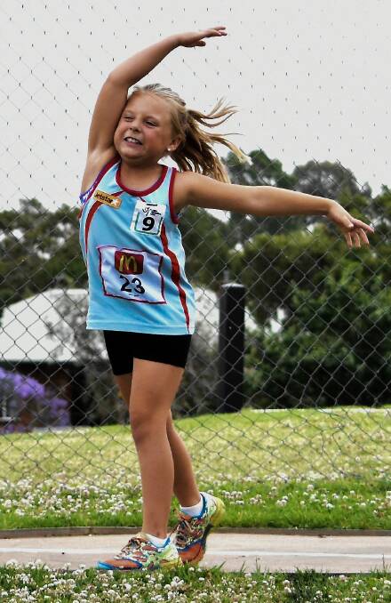 FORM: Kailen Butt looked to be in great form while throwing a discus during a Little Athletics night at Northparkes Oval last month. More photos to come in a later paper.