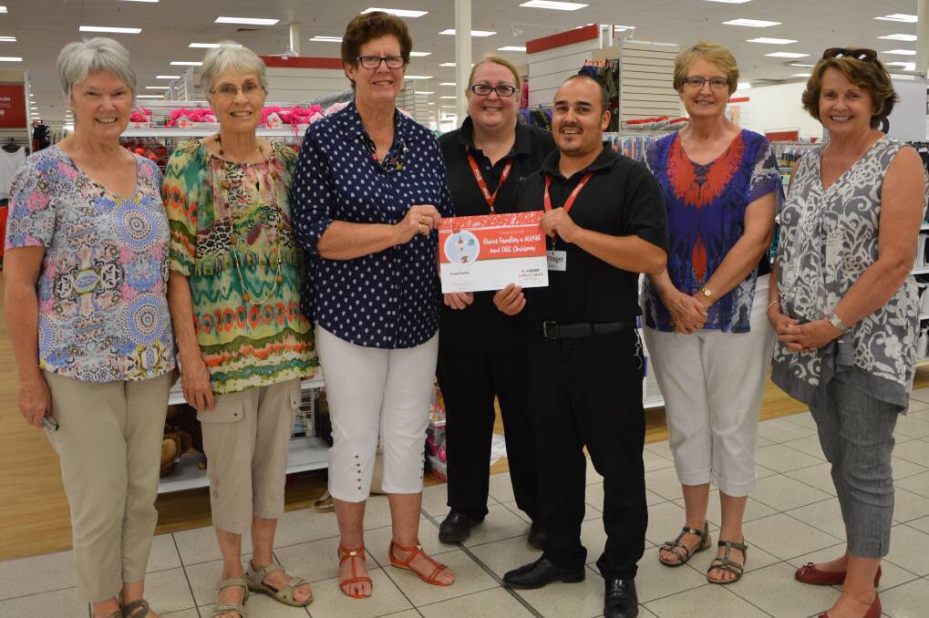 BIG THANKS: Parkes Uniting Care members dropped into say thanks to the staff at Target in Parkes for their role in last year's appeal.