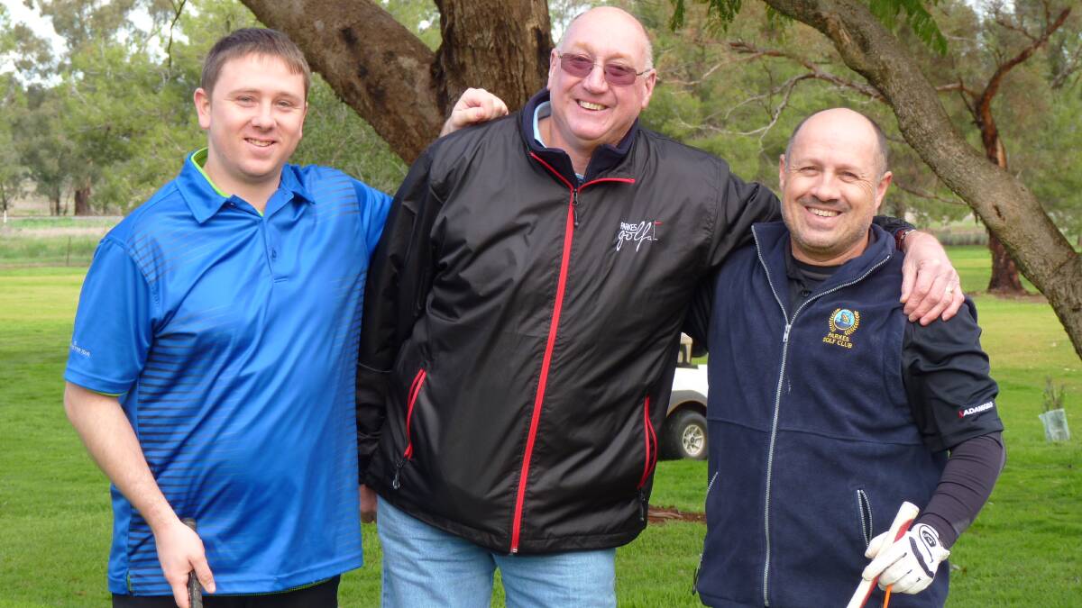 IGA Scratch Shootout winner Joey Van Opynen and runner-up Mark Kelly are congratulated by Peter Boschman on their success in the IGA Shootout on the weekend. 