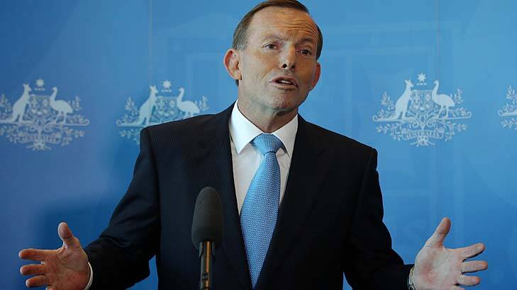 Prime Minister Tony Abbott said the Immigration Minister was doing a ''sterling'' job. Photo: Alex Ellinghausen 