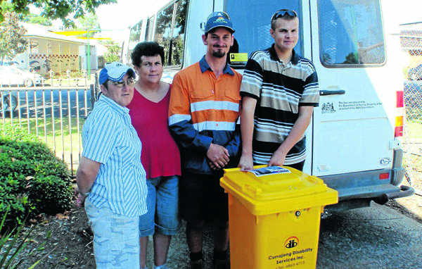 Fiona McGonigal, DeArne Callaghan, Jamin Joha and Thomas Ellison prepare to shred paper at Currajong Disability Services.