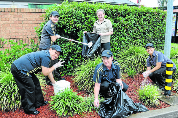 Pictured tidying-up around the Parkes McDonalds store earlier this week are (back-row, left to right) Paige Ellis and Samantha Mill; front: Jingle Babora, Anna Kliese and Melinda Wild.  