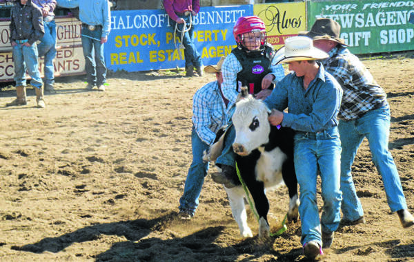 Eleven year old Parkes boy, Cody Hall has cerebral palsy, but it doesn’t stop him from doing things most other people avoid - riding bulls!   Cody is pictured in action.