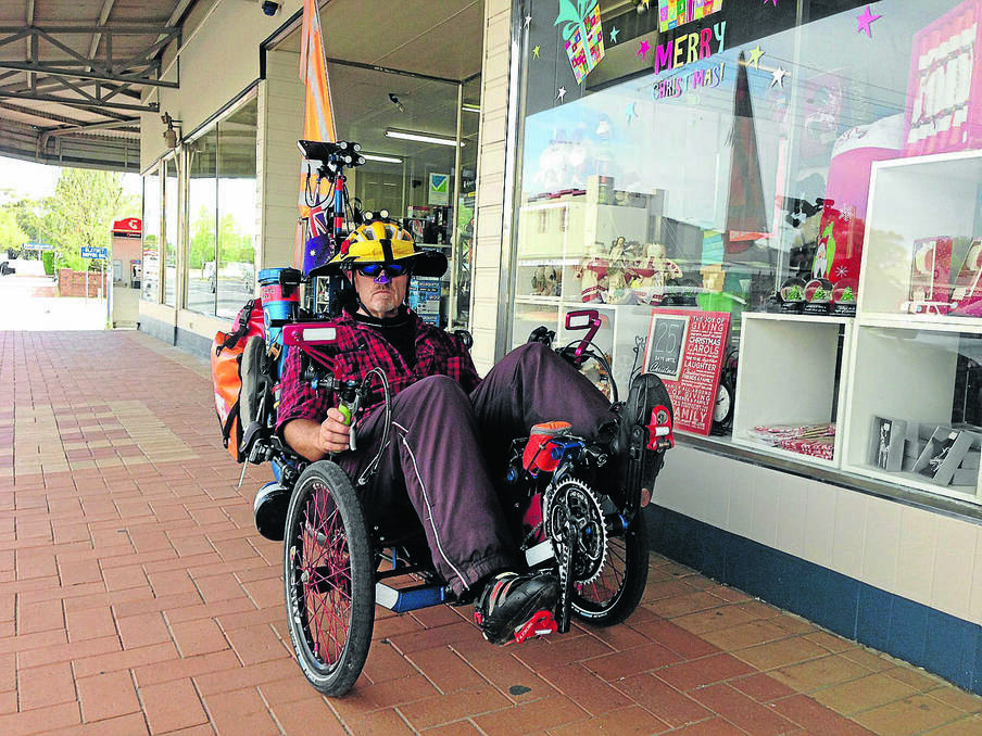 BLAYNEY: Sydney resident Simon Maitek was spotted in front of Blayney Newsagency on Tuesday morning riding this unusual recumbent bicycle. He was planning to spend a night in Blayney before returning home again under his own pedal power.