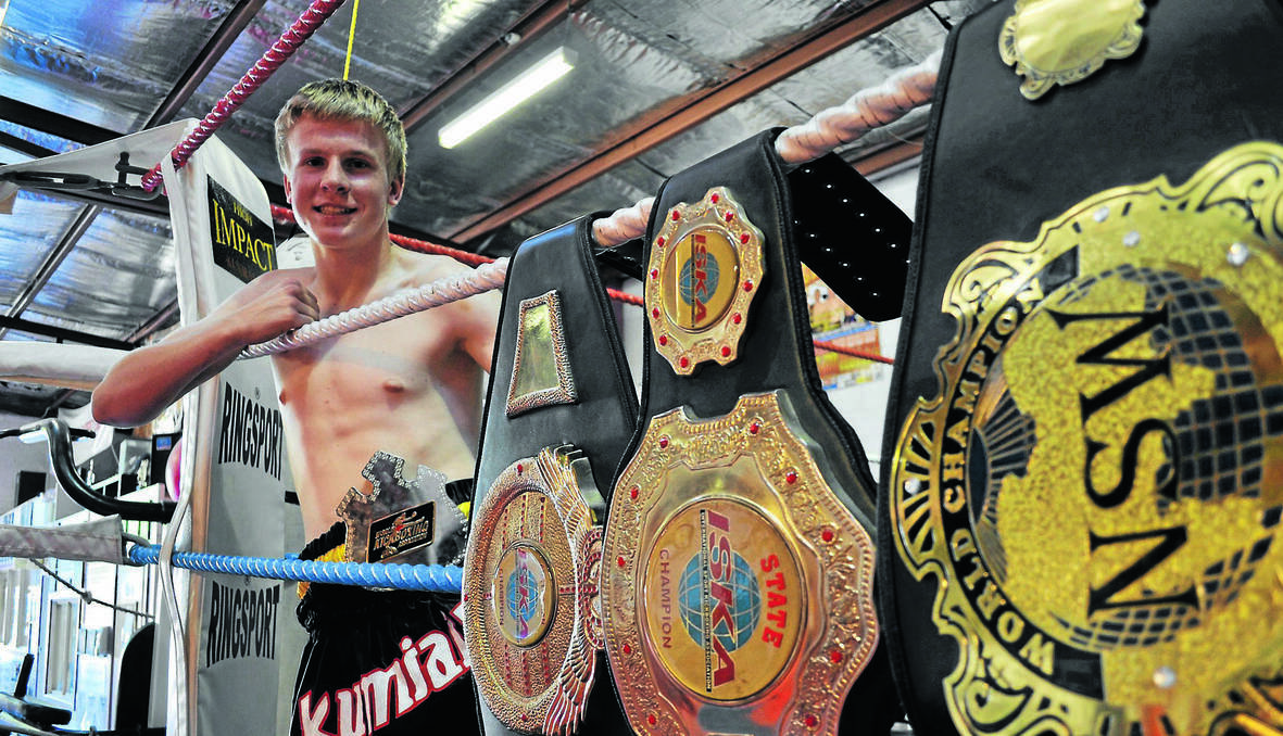 ORANGE: Charlie Bubb is fast gaining a serious belt collection after the 16-year-old muay thai fighter won yet another title in Canberra last month. Photo: NICK McGRATH