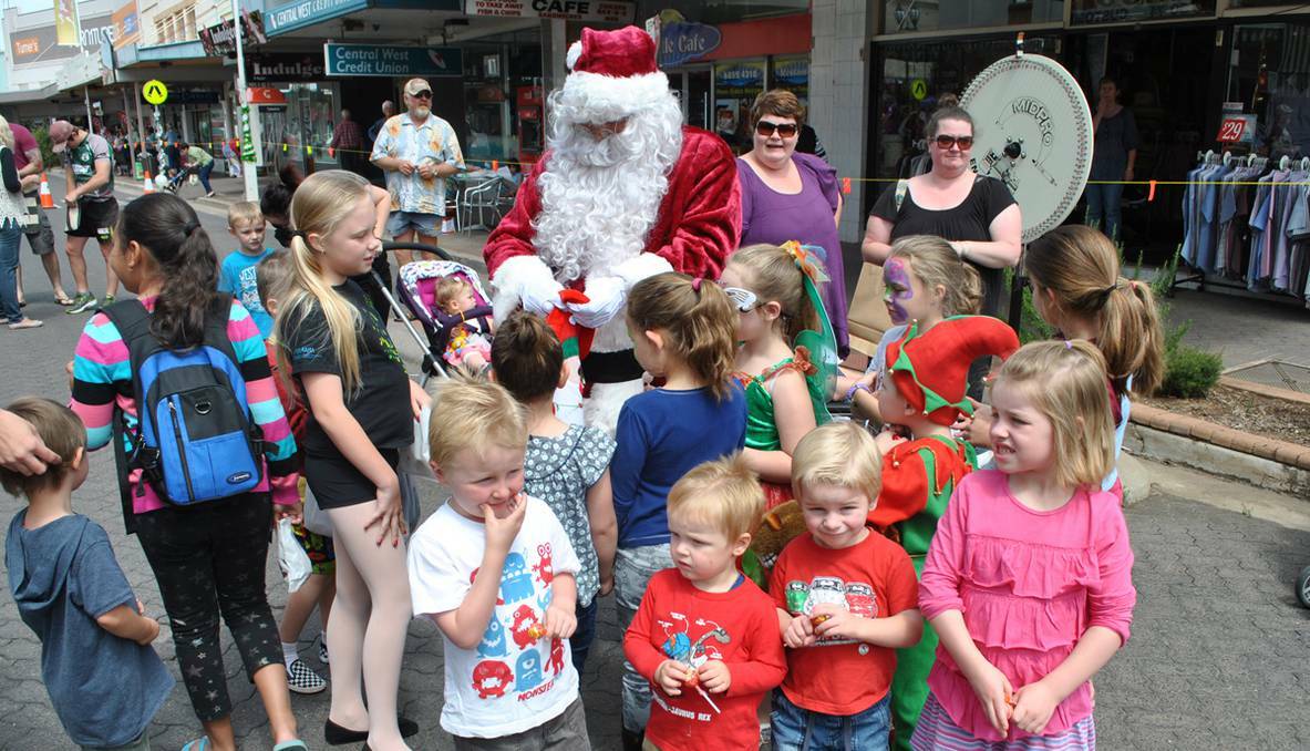 FORBES: Santa Claus was very popular at the Christmas Festival, handing out lollies to the kids.