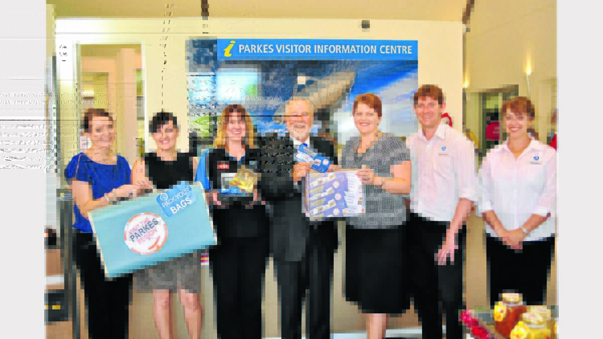 Pictured at the draw of the Passport to Parkes campaign are tourism staff, Chia Barlow, Peta Coote, Tracey Ellery, Parkes Mayor, Ken Keith, Parkes Tourism Manager, Kelly Hendry, Chris Hollingdrake (Telescope Visitors Discovery Centre Manager) and Bev Wilson (Communication Officer).