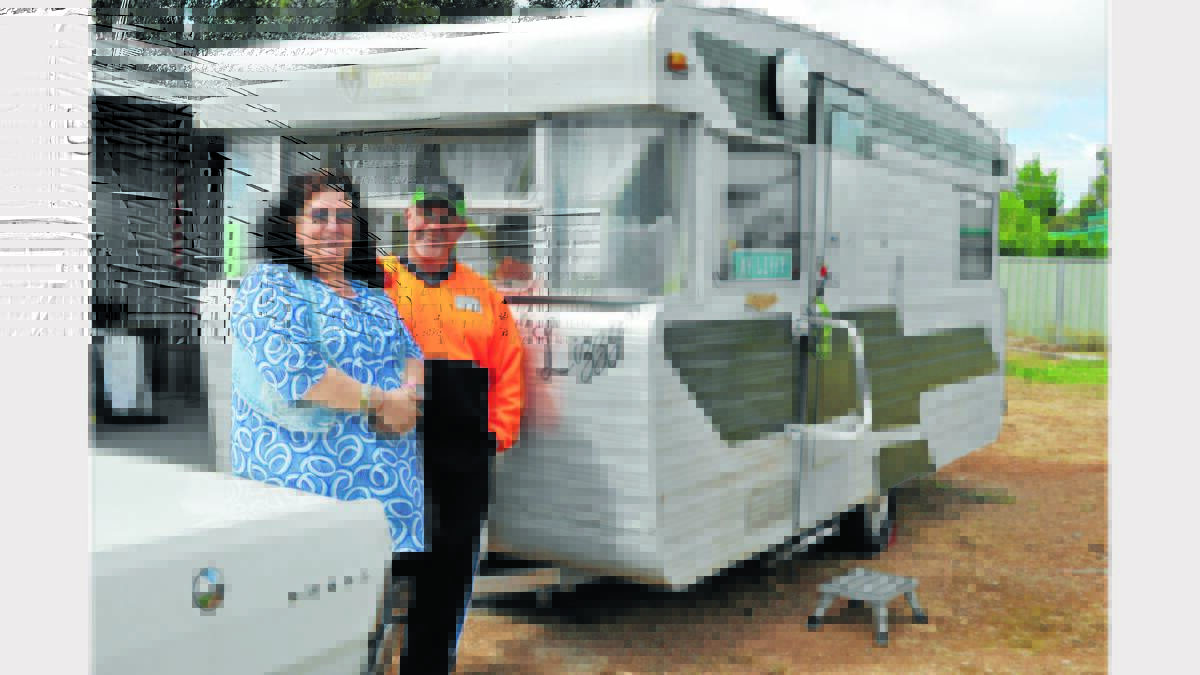 Maree and Steve Mulligan with their van `Lizzy’ that will take part in this weekend’s Museum of the Long Weekend celebrations in Canberra.   Photo: Barbara Reeves   