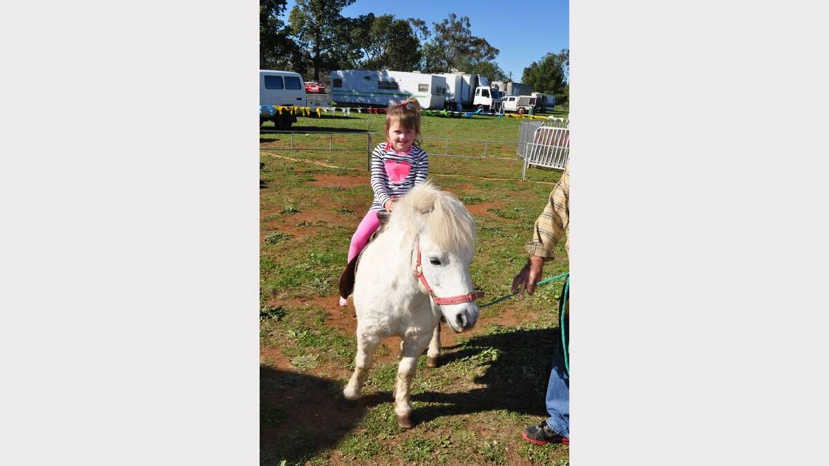 Bailee McAneney (4) of Trundle enjoyed her pony ride.