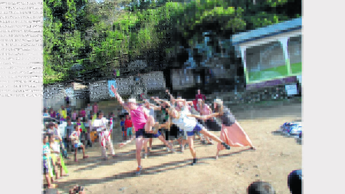  Jack Thomson, Anna-May Evans and Zoe Schulze were at the forefront of the group of students during an educational performance at a village in East Timor.