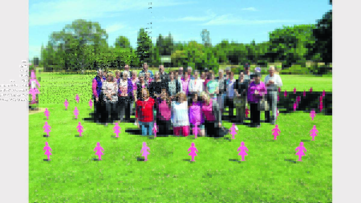 Pictured in front of community members who went along to share their support of breast cancer sufferers are from left - Anne Marie Winter, Jessica Behan, Dianne Green (McGrath Breast Care Nurse and organiser), Tarlia Egan and Madison Ehsman. 