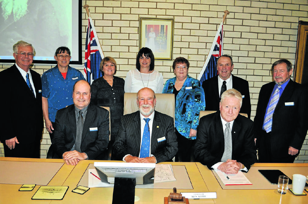 The newly elected Parkes Shire Council at their first meeting yesterday - back row, councillors Bob Haddin, Louise O’Leary, Barbara Newton, Belinda McCorkell, Patrica Smith, Kenny McGrath, George Pratt; seated, Alan Ward (Deputy Mayor, Ken Keith (Mayor) and Michael Greenwood. 