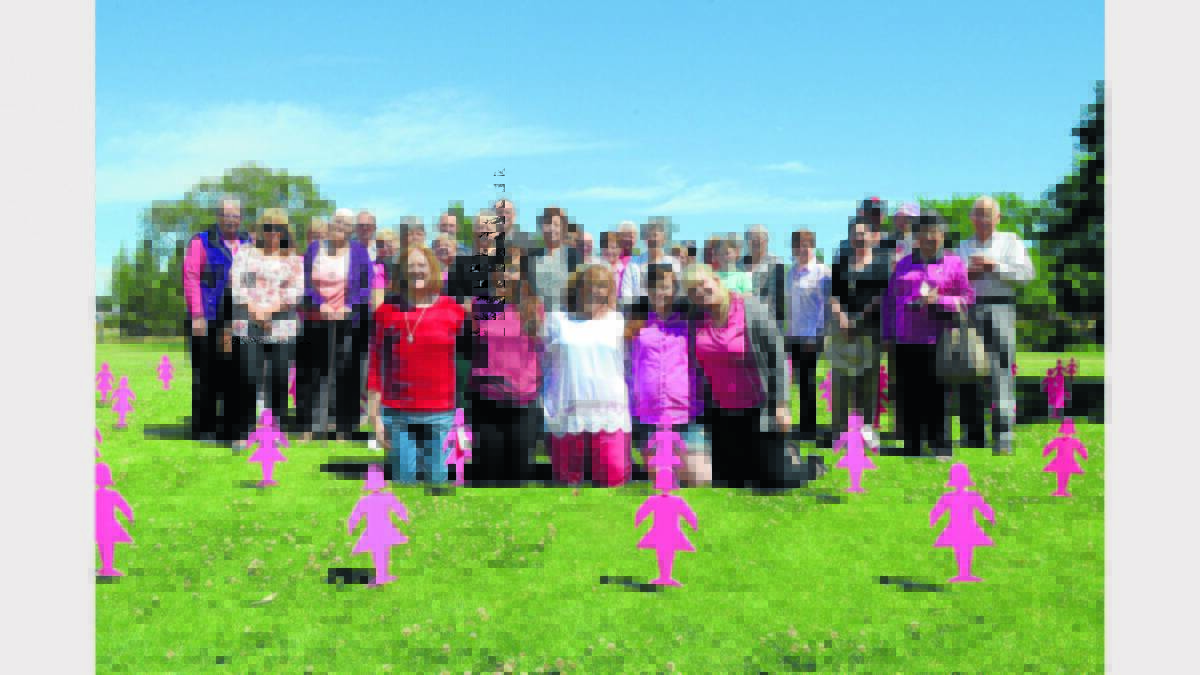 Pictured in front of community members who went along to share their support of breast cancer sufferers are from left - Anne Marie Winter, Jessica Behan, Dianne Green (McGrath Breast Care Nurse and organiser), Tarlia Egan and Madison Ehsman.