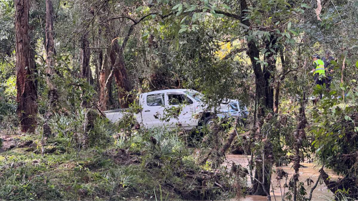 A 71-year-old man was discovered near this car in Greenbank. Picture ABC News/Victoria Pengilley

