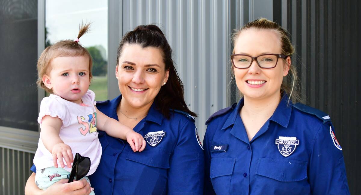 PARAMEDICS: One-year-old Isabella Fox and her mother and paramedic Adriana Fox, with fellow paramedic Emily Stannard. Photo: BRADLEY JURD