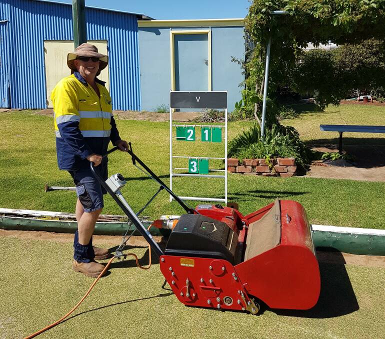 RAILWAY BOWLS: Juicy Daly with new mower purchased from grant money from Northparkes Mines and Parkes Sports Council. Photo: Submitted