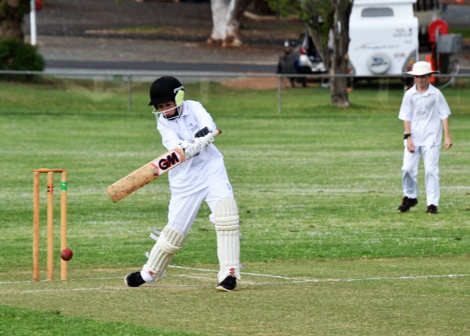Eye on the Ball: Lachlan Plummer bats for Thunder in an Under 14s game. Photos: Jenny Kingham.