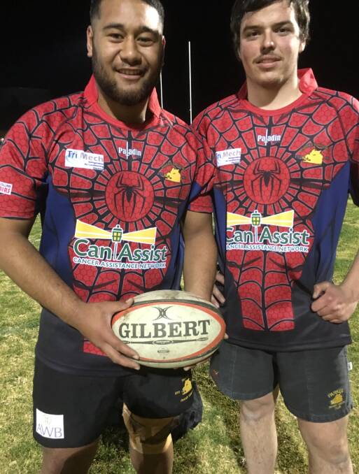 Looking Good: Steve Tautao  (on the left) and Scott Chislett model the charity jersey's that the first grade side will be wearing this weekend.