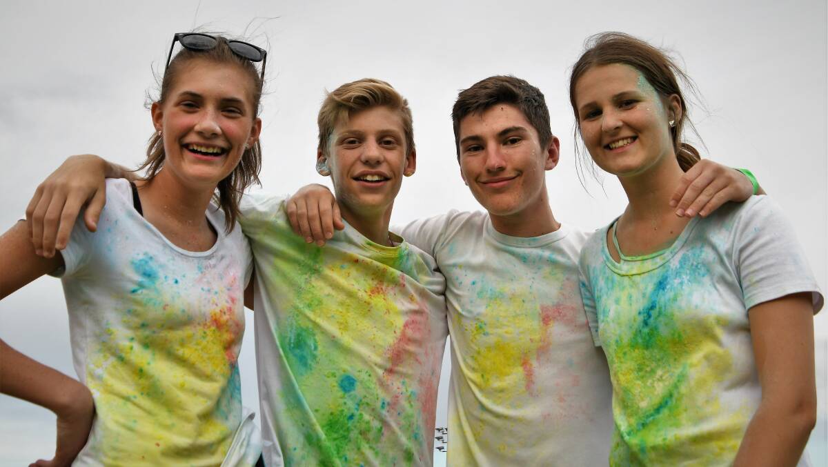 COLOUR RUN: The Parkes Squash Club hosted a colour run at Pioneer Oval on March 1, which saw Chloe Mason, Sam Leverck, Zac Redfern and Holly McColl support the cause that was raising money for the disability service provider House With No Steps. More photos appear on page 5.